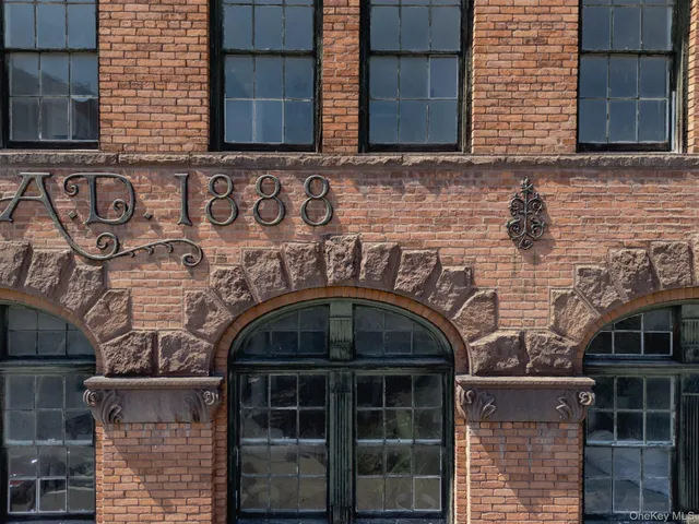 a view of swimming pool with outdoor seating and yard
