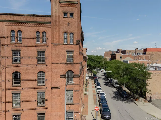 a front view of a building with glass windows