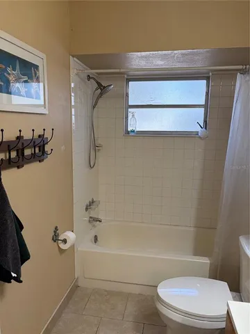 a room with table and chairs