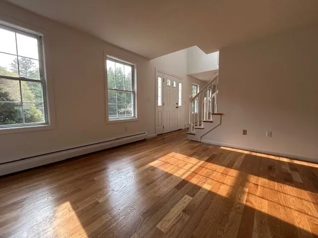 a view of an empty room and window