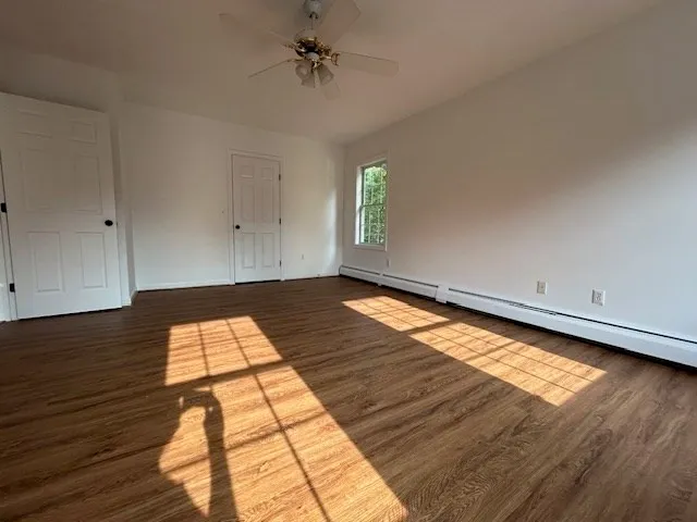 a view of an empty room and window