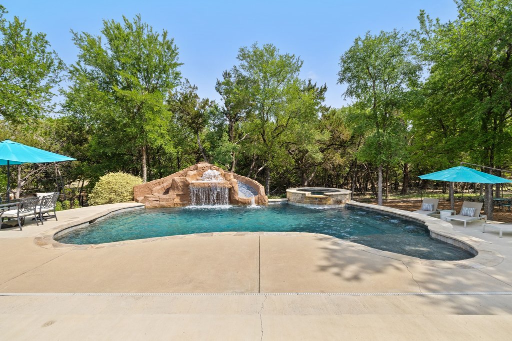 108 Berry Cove Georgetown, TX 78628 - Photo 35 of 39 a garden view with a seating space