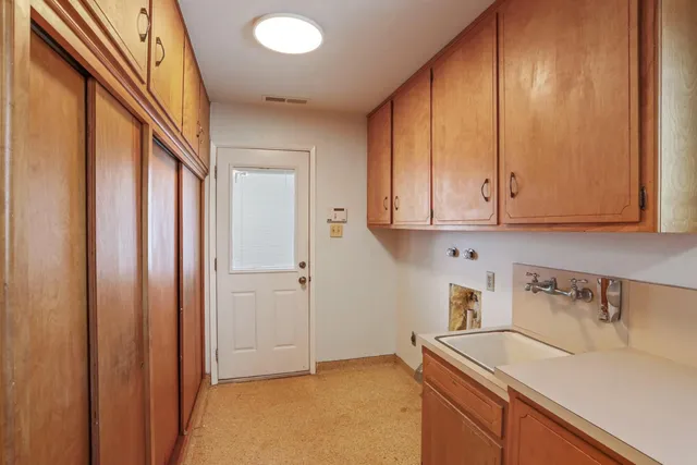 a room with storage and utility