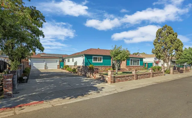 a view of a house with a patio