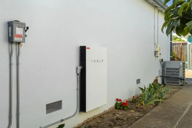 a view of a house with swimming pool and sitting area