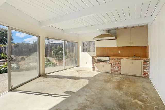 a utility room with washer and dryer