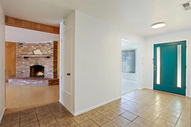 a view of a livingroom with a fireplace