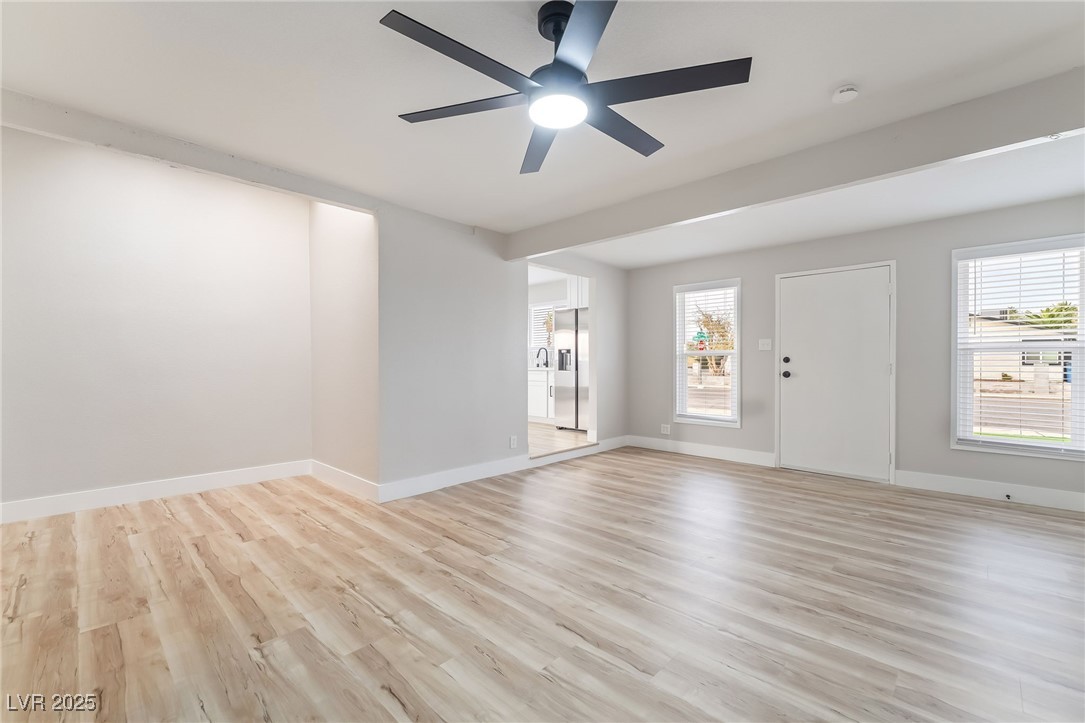 652 Red Lake Way Las Vegas, NV 89110 - Photo 20 of 66 Foyer featuring light wood-type flooring and a ceiling fan