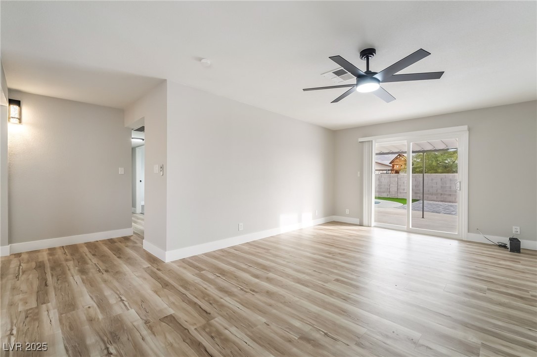652 Red Lake Way Las Vegas, NV 89110 - Photo 22 of 66 Unfurnished room with light wood-style floors and a ceiling fan