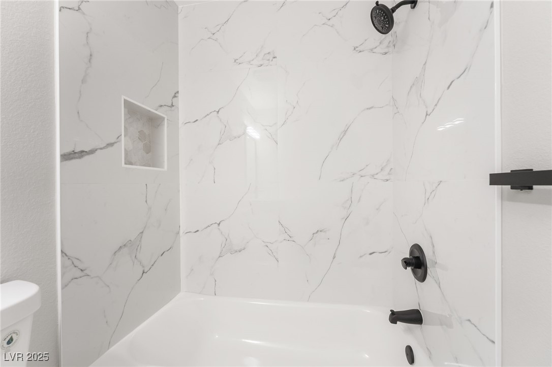 652 Red Lake Way Las Vegas, NV 89110 - Photo 33 of 66 Full bath with shower combination and toilet