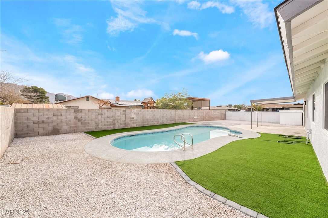 652 Red Lake Way Las Vegas, NV 89110 - Photo 47 of 66 View of pool featuring a patio area and a fenced backyard