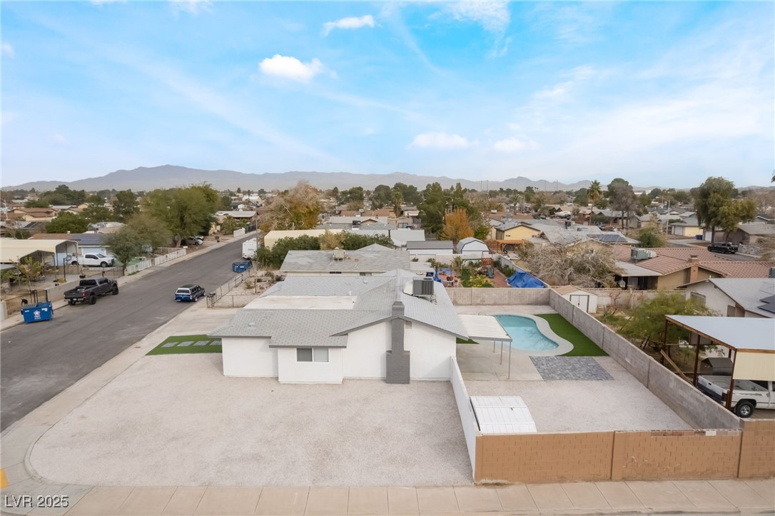 652 Red Lake Way Las Vegas, NV 89110 - Photo 49 of 66 Aerial view of residential area featuring a mountain backdrop