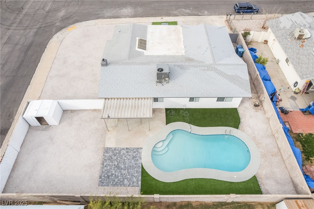 652 Red Lake Way Las Vegas, NV 89110 - Photo 54 of 66 View of subject property featuring a pool area