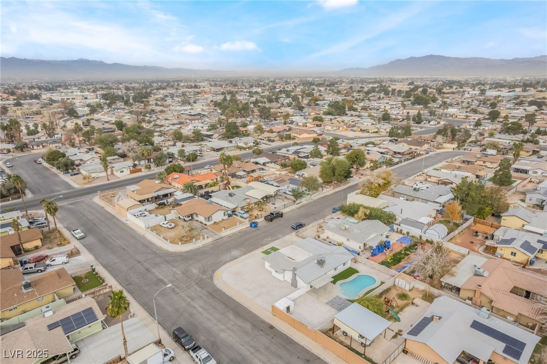 652 Red Lake Way Las Vegas, NV 89110 - Photo 61 of 66 Aerial perspective of suburban area featuring a mountainous background