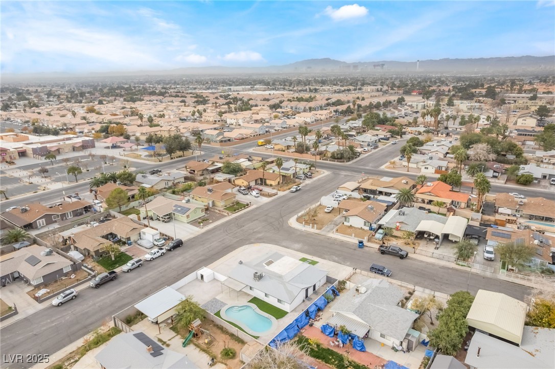 652 Red Lake Way Las Vegas, NV 89110 - Photo 63 of 66 Aerial view of residential area with a mountainous background