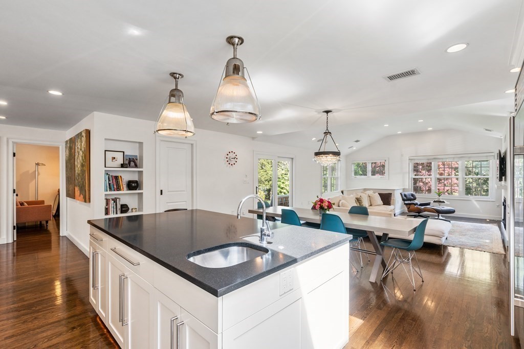 60 Levbert Road Newton, MA 02459 - Photo 8 of 28 a kitchen with counter top space and living room