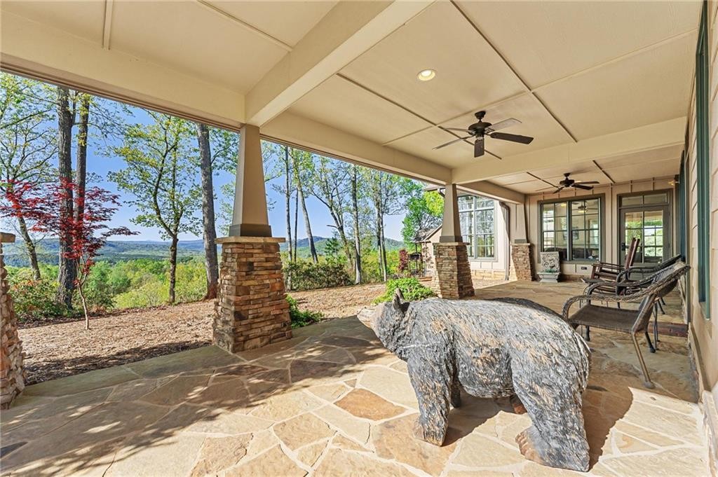 0 Gabriel Way Pickens, SC 29671 - Photo 11 of 14 This expansive covered patio offers serene mountain views and generous outdoor living space.