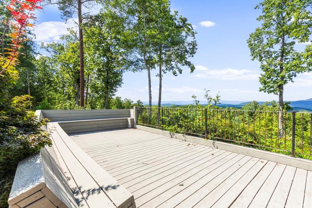 0 Gabriel Way Pickens, SC 29671 - Photo 13 of 14 This outdoor deck provides panoramic views of the surrounding natural landscape and distant mountains.