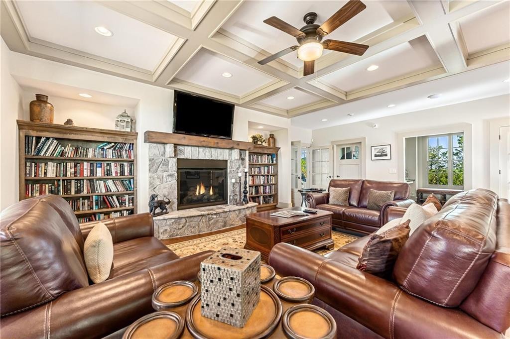 0 Gabriel Way Pickens, SC 29671 - Photo 5 of 14 This inviting living space features a cozy fireplace and built-in shelving, perfect for relaxation and entertaining.
