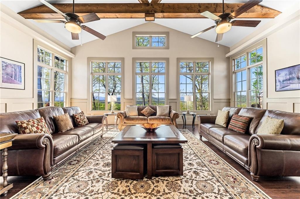 0 Gabriel Way Pickens, SC 29671 - Photo 7 of 14 An inviting living area with expansive windows offers abundant natural light and scenic outdoor views.