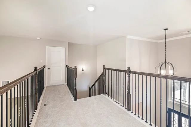 a view of a hallway with window