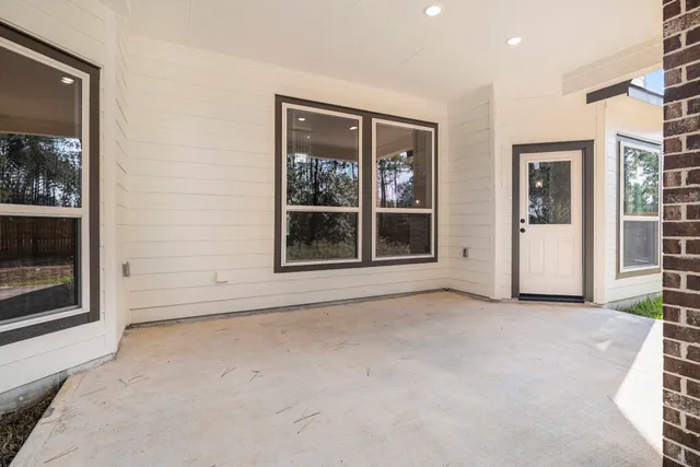 an empty room with windows