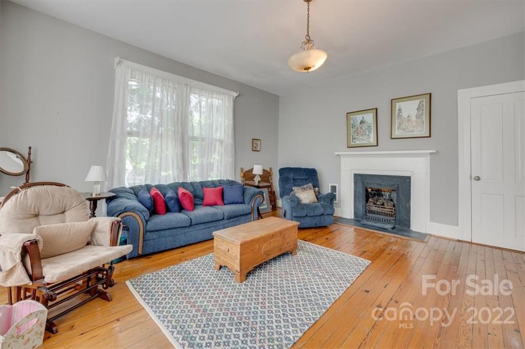 204 West South Street Union, SC 29379 - Photo 27 of 38 a living room with furniture and a fireplace