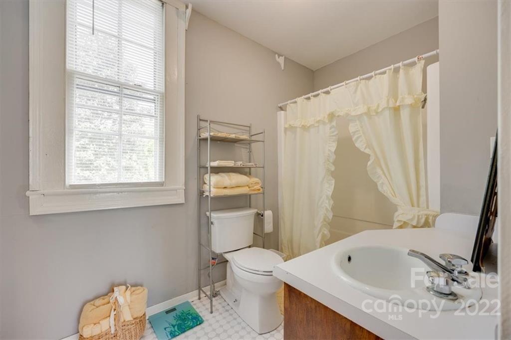 204 West South Street Union, SC 29379 - Photo 31 of 38 a bathroom with a sink toilet and shower