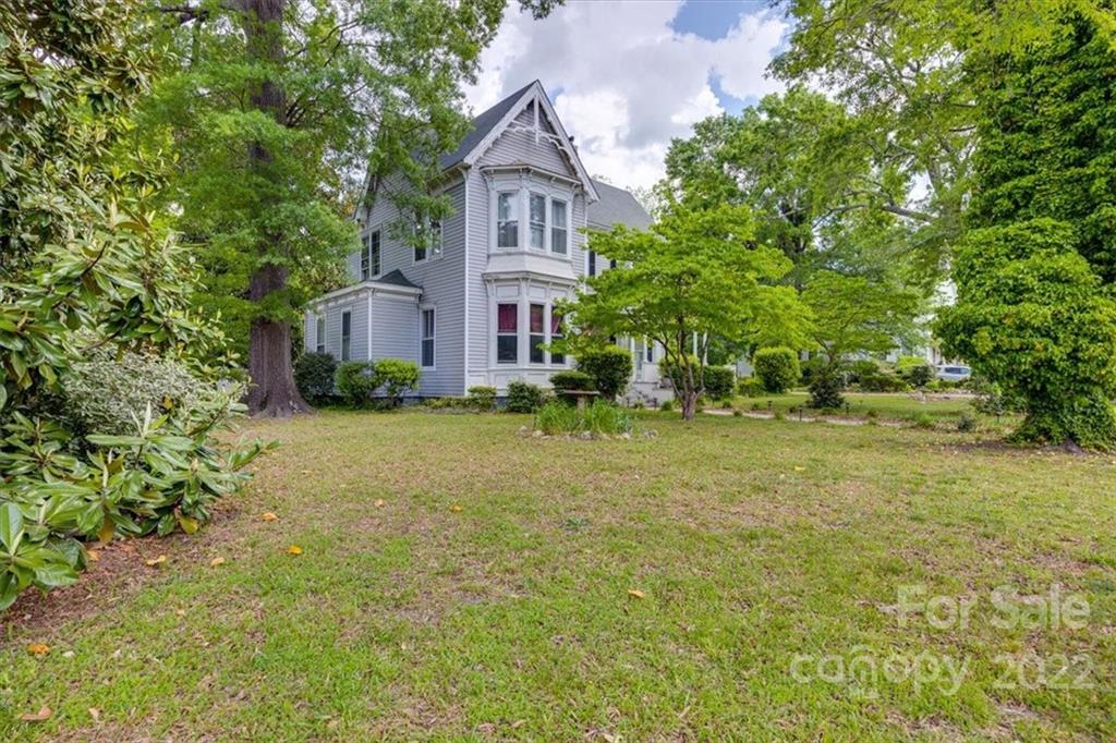 204 West South Street Union, SC 29379 - Photo 34 of 38 a front view of a house with garden