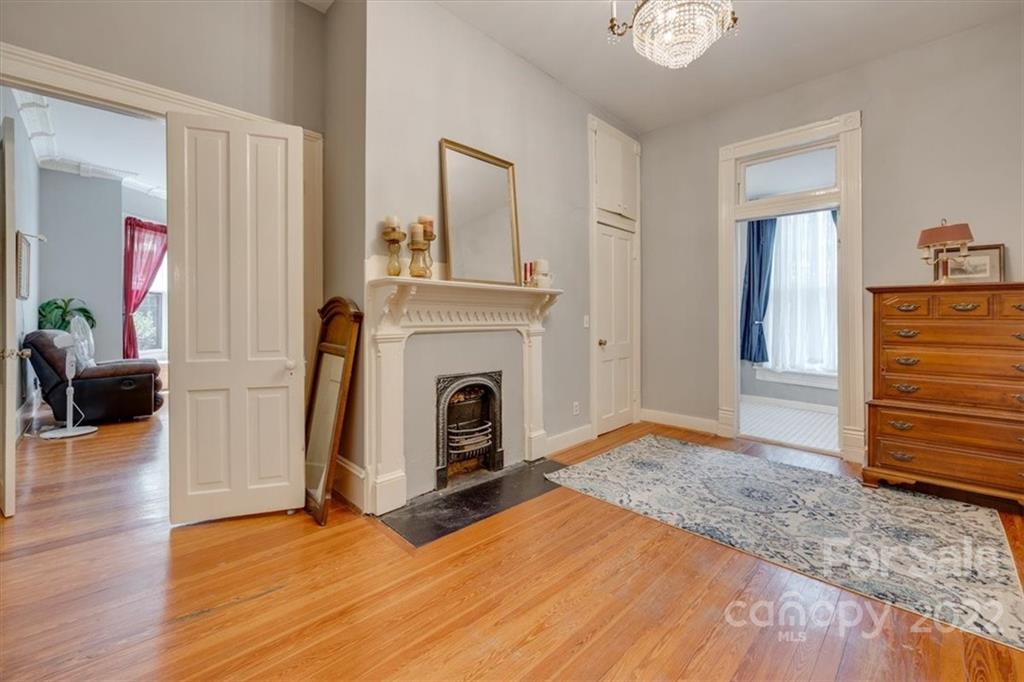 204 West South Street Union, SC 29379 - Photo 8 of 38 a view of livingroom with hardwood floor and a fireplace