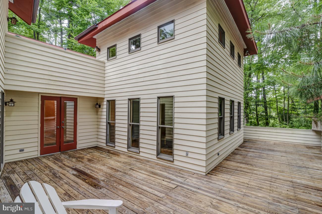 83 Battersea Road Ocean Pines, MD 21811 - Photo 39 of 55 Wrap around decking lower level