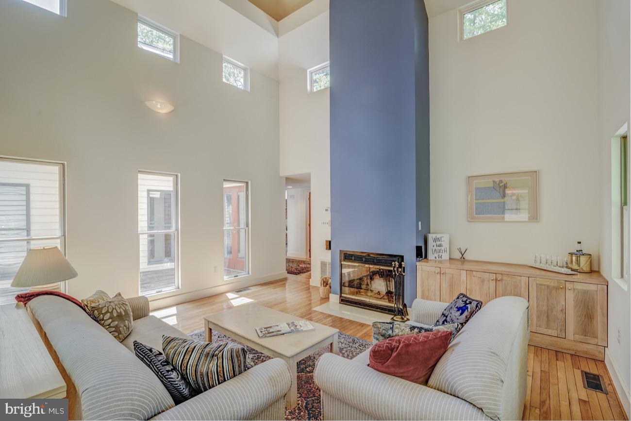 83 Battersea Road Ocean Pines, MD 21811 - Photo 5 of 55 Living room with wood burning fireplace