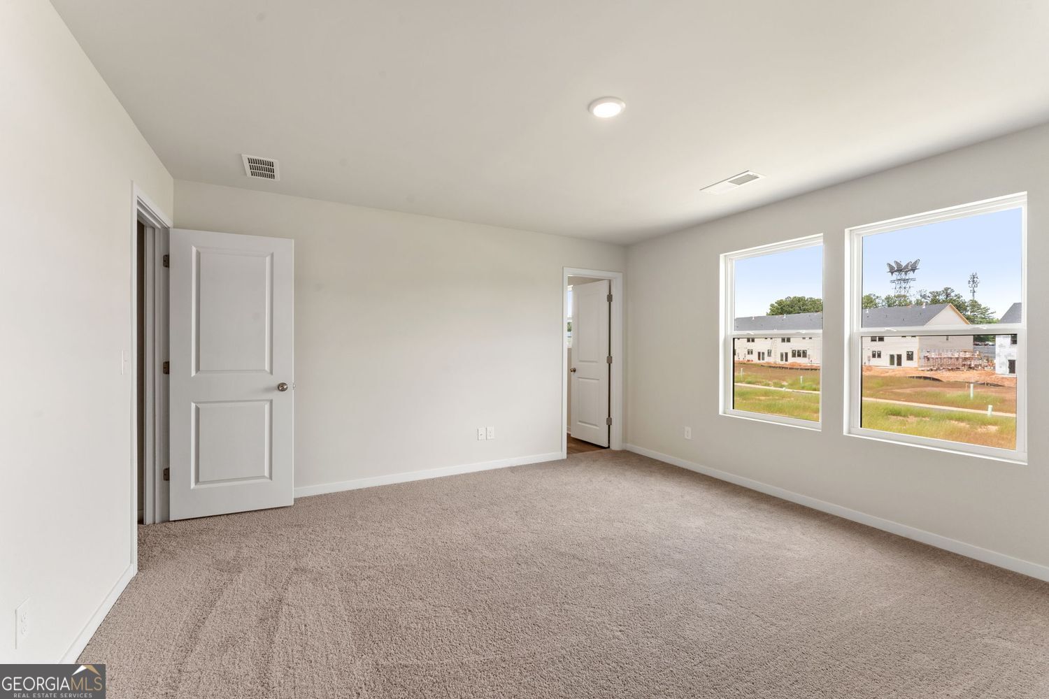 1299 Farmers Loop Austell, GA 30106 - Photo 16 of 23 a view of an empty room with a window