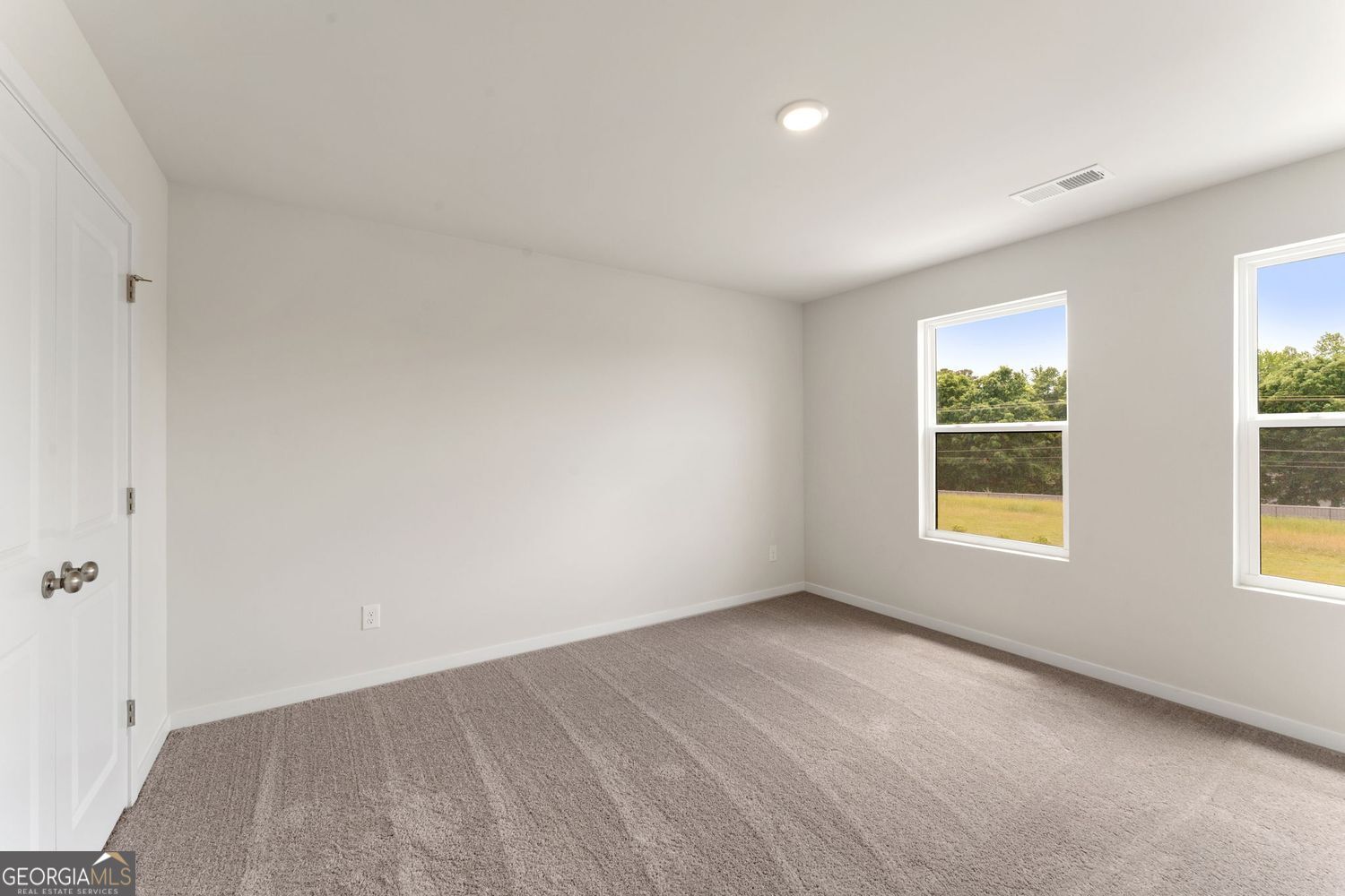 1299 Farmers Loop Austell, GA 30106 - Photo 20 of 23 an empty room with windows
