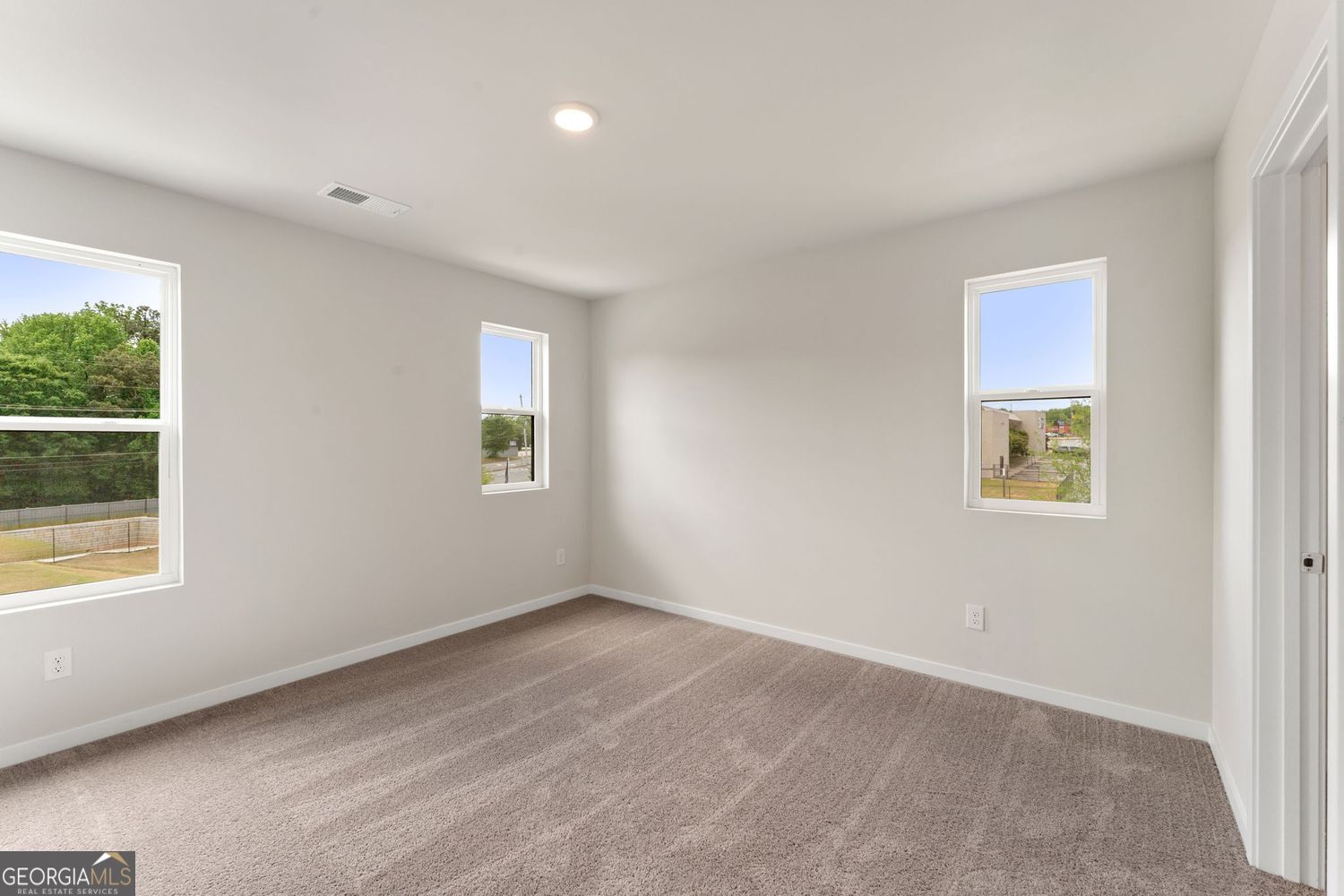 1299 Farmers Loop Austell, GA 30106 - Photo 21 of 23 a view of an empty room with a window