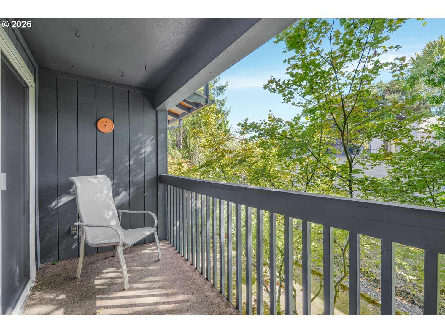 650 Southwest Meadow Drive, Unit 218 Beaverton, OR 97006 - Photo 13 of 25 a view of a chair and table in the balcony