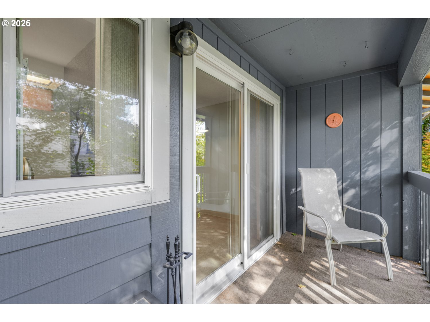 650 Southwest Meadow Drive, Unit 218 Beaverton, OR 97006 - Photo 14 of 25 a chair and table in a room