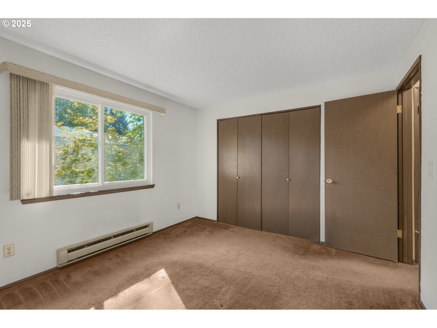 650 Southwest Meadow Drive, Unit 218 Beaverton, OR 97006 - Photo 20 of 25 a view of an empty room with a window