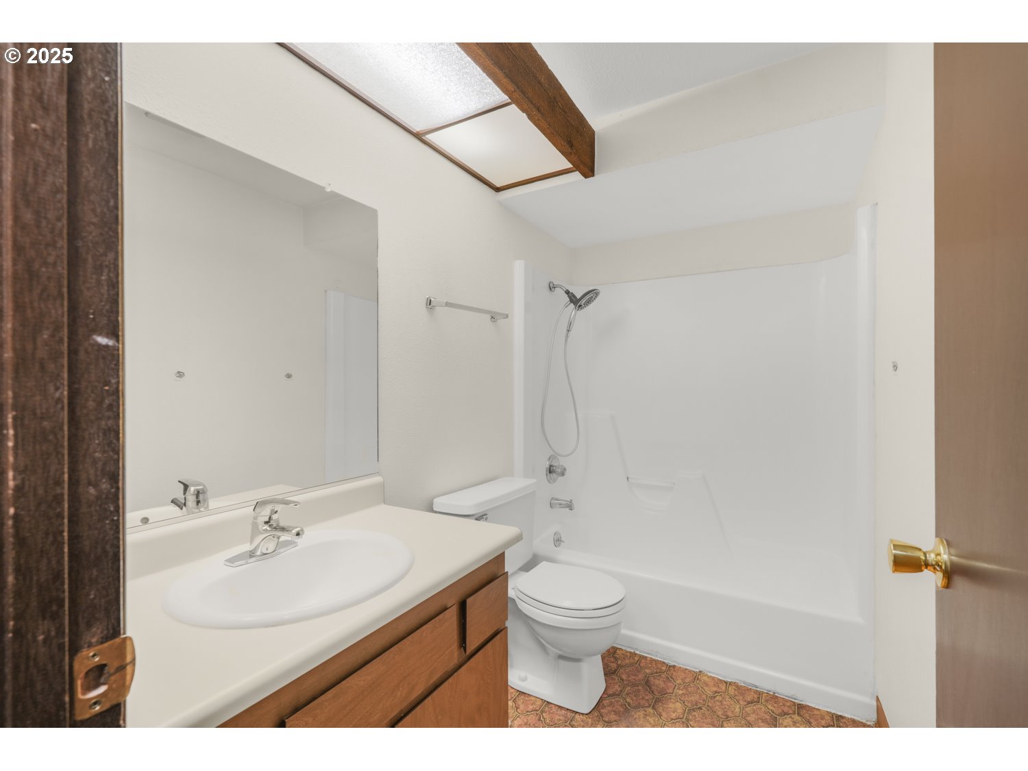 650 Southwest Meadow Drive, Unit 218 Beaverton, OR 97006 - Photo 21 of 25 a bathroom with a sink toilet and shower