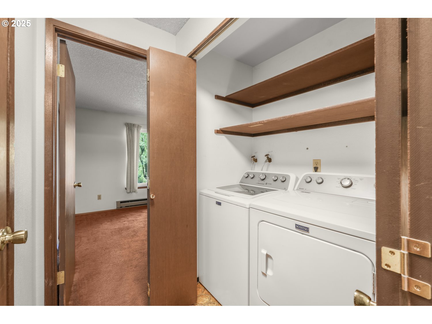 650 Southwest Meadow Drive, Unit 218 Beaverton, OR 97006 - Photo 22 of 25 a utility room with dryer and washer