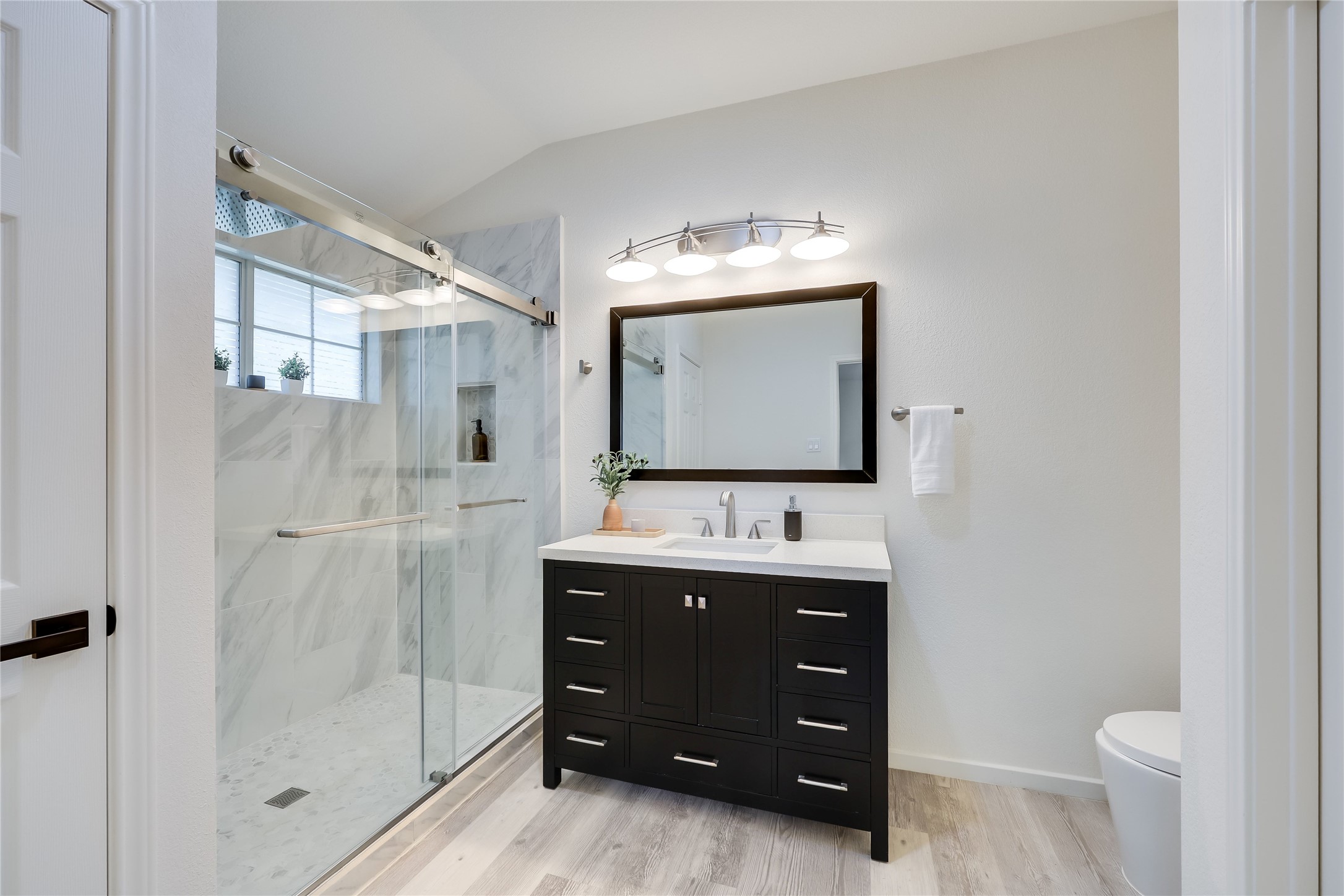 1900 Scofield Ridge Parkway, Unit 501 Austin, TX 78727 - Photo 18 of 31 a bathroom with a toilet sink and mirror