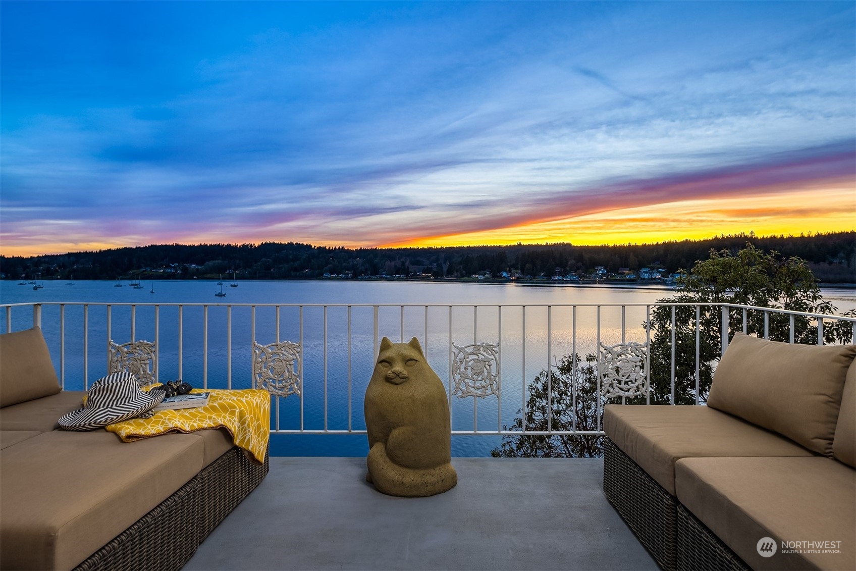 19083 Front Street Northeast, Unit 4 Poulsbo, WA 98370 - Photo 24 of 40 a view of swimming pool with furniture and a garden
