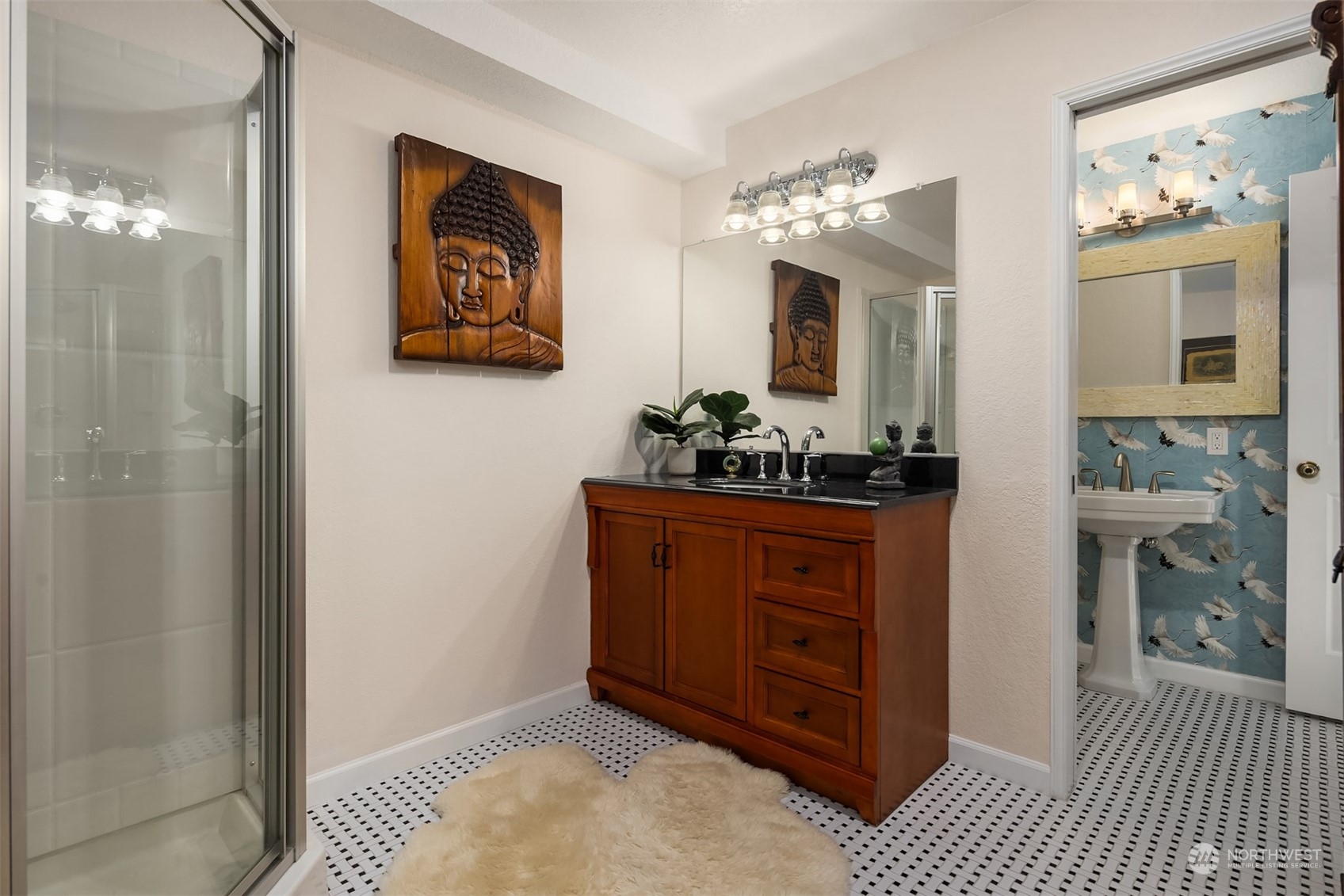 19083 Front Street Northeast, Unit 4 Poulsbo, WA 98370 - Photo 29 of 40 a spacious bathroom with a double vanity sink and a mirror
