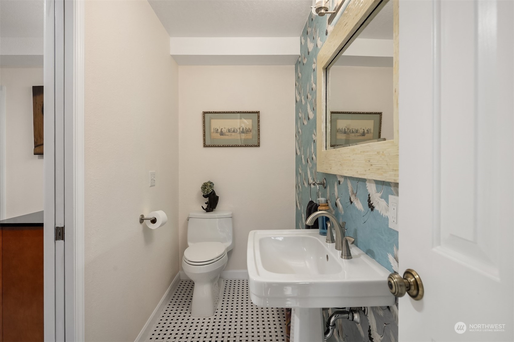 19083 Front Street Northeast, Unit 4 Poulsbo, WA 98370 - Photo 31 of 40 a bathroom with a sink toilet and a mirror