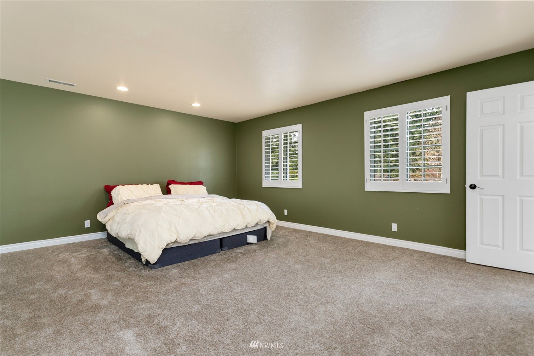 20605 Southeast 159th Street Renton, WA 98059 - Photo 19 of 40 a bed sitting in a room next to a window