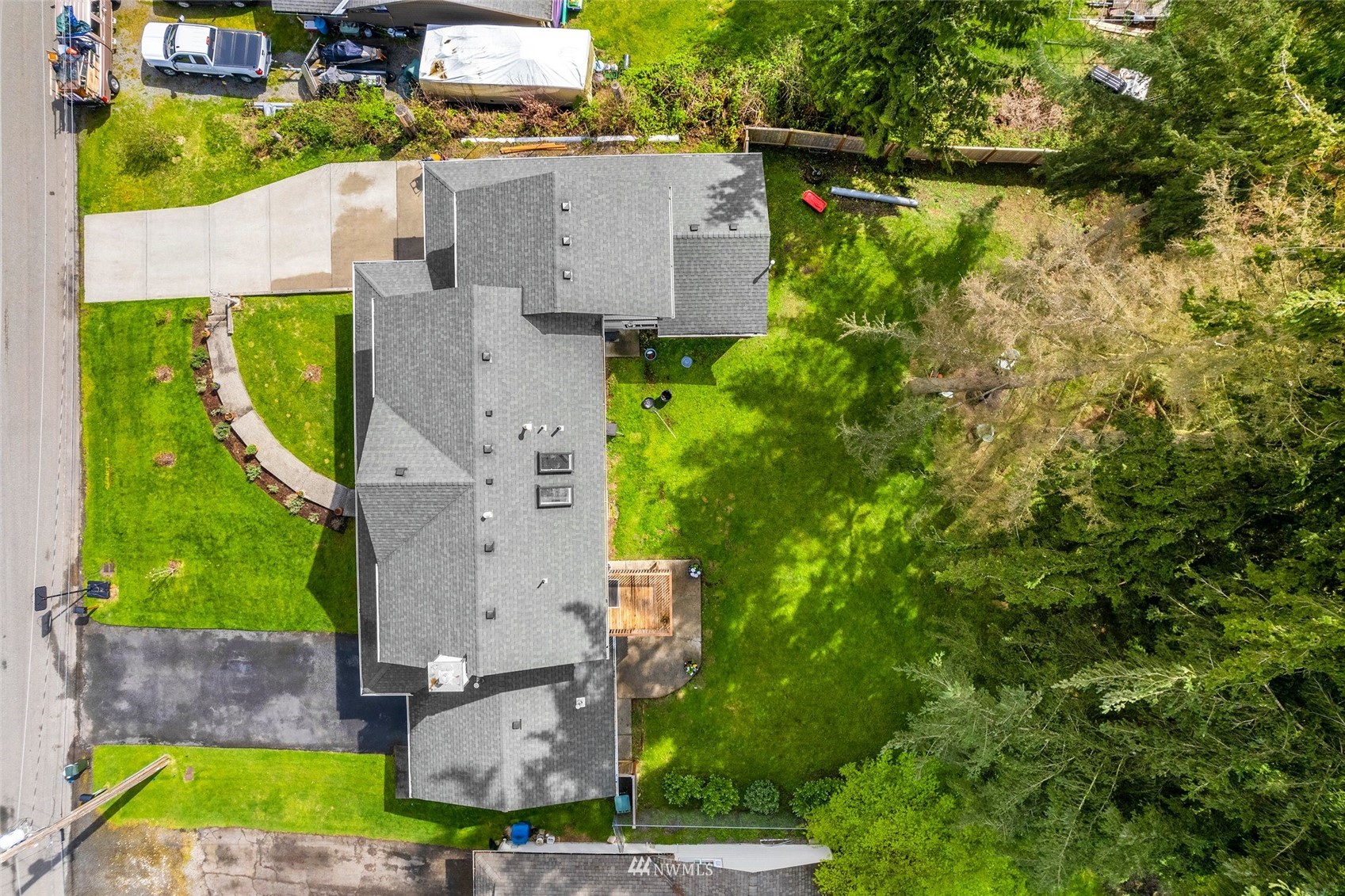 20605 Southeast 159th Street Renton, WA 98059 - Photo 35 of 40 an aerial view of a house with a garden and trees
