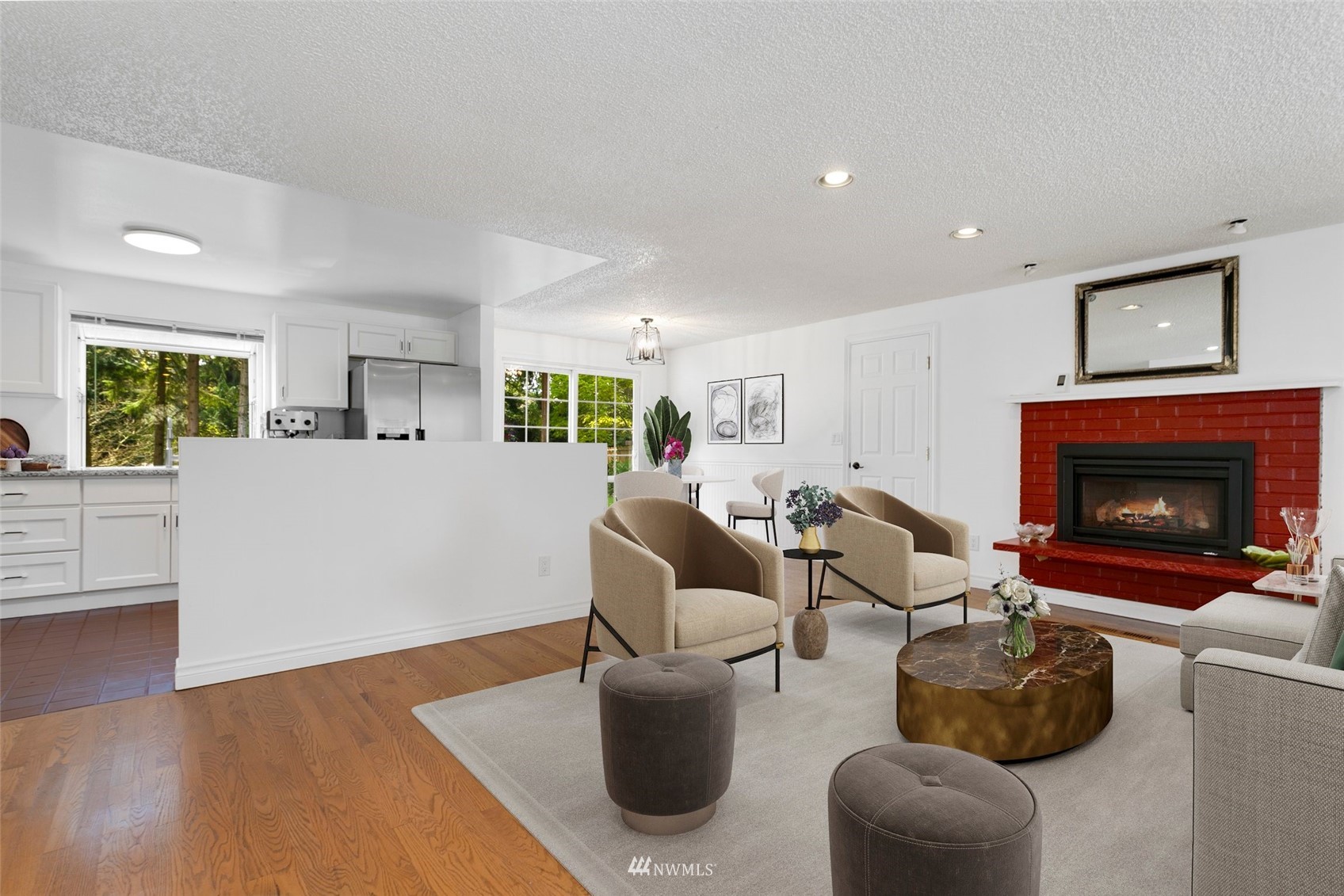 20605 Southeast 159th Street Renton, WA 98059 - Photo 6 of 40 a living room with furniture and a fireplace