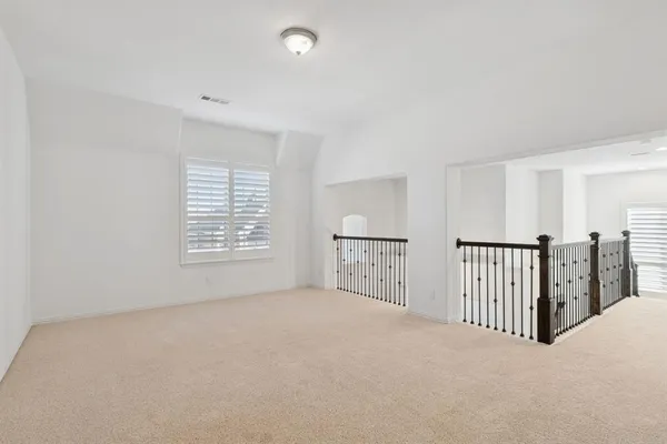 a view of a room with windows