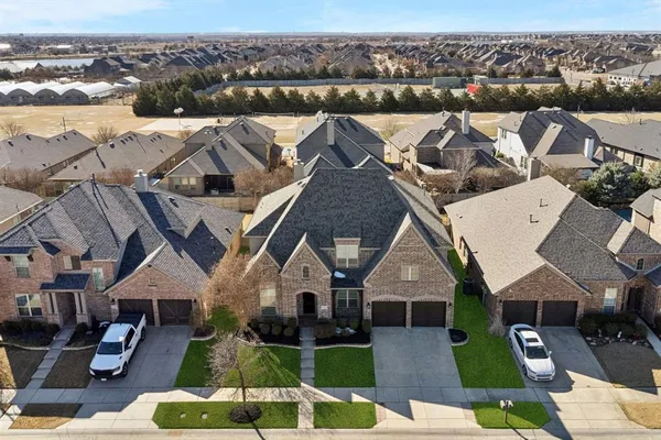 an aerial view of a house with a garden