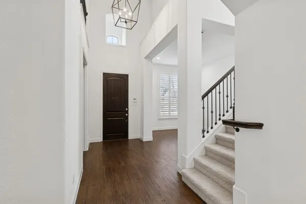a view of entryway with wooden floor